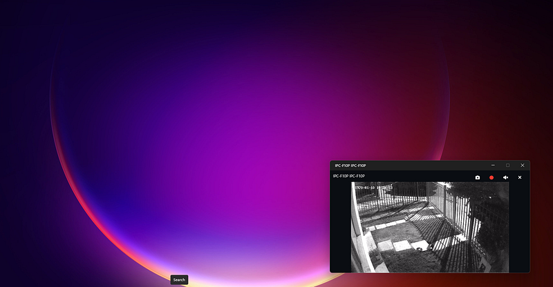 ReCam Viewer overlay window showing an IP camera over the Windows desktop
